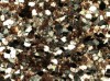 Figure 3A. Low magnification view (crossed polars) showing well sorted subrounded grains of quartz and minor 
			feldspar cemented by calcite microspar and some anhydrite.